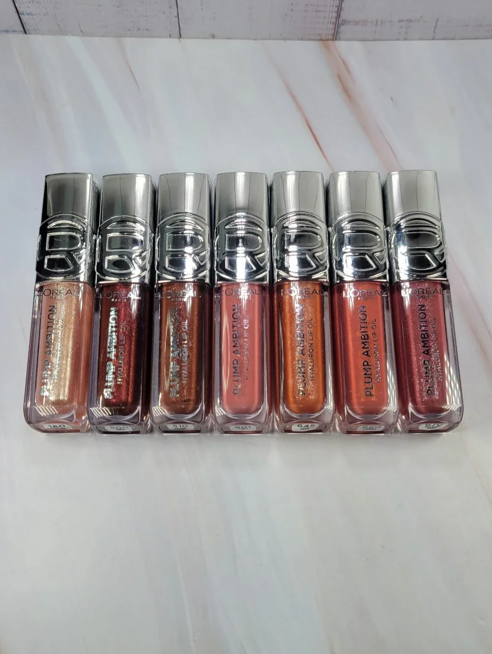 7 Piece L'Oréal Plump Ambition Hyaluron Lip Oil Bundle NEW!